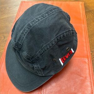 Levi’s ballcap. Adjustable, vented, black w/red/white stitching. 3”brim, v. soft